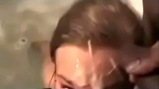 Blonde in the bathtub sucks off a black cock and gets a hugely messy facial